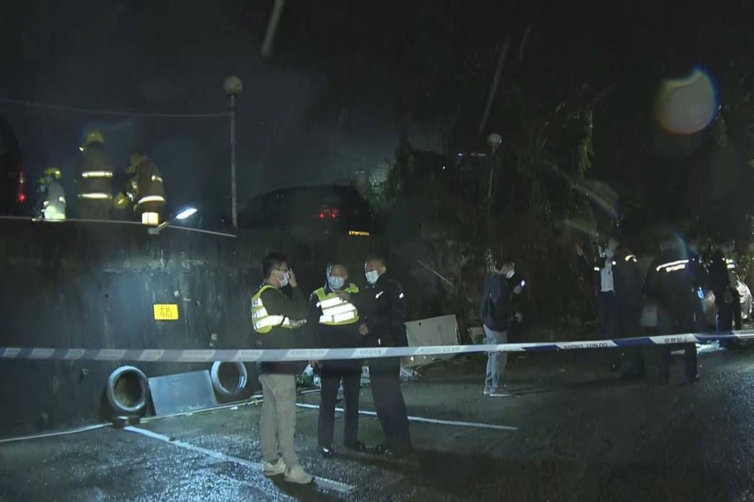 Officers and firefighters at the scene of the blaze in Ma Yau Tong Village. Photo: NOW TV NEWS