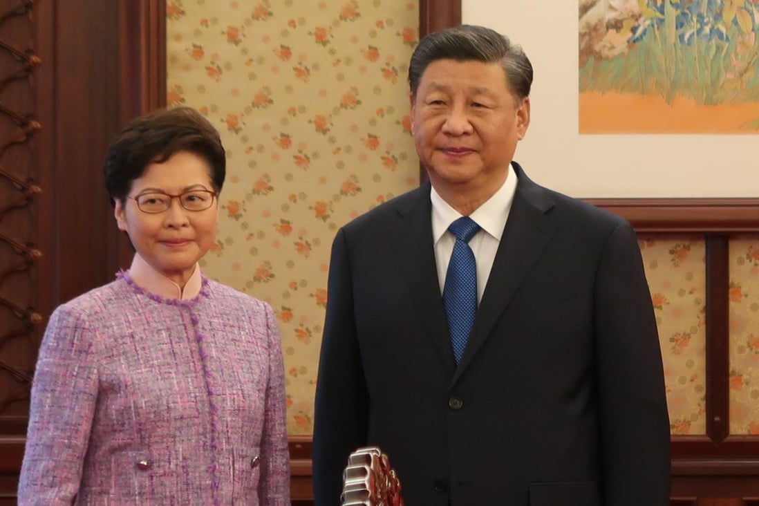 Hong Kong leader Carrie Lam met with Chinese President Xi Jinping in Beijing on December 22, 2021. Photo: Pool