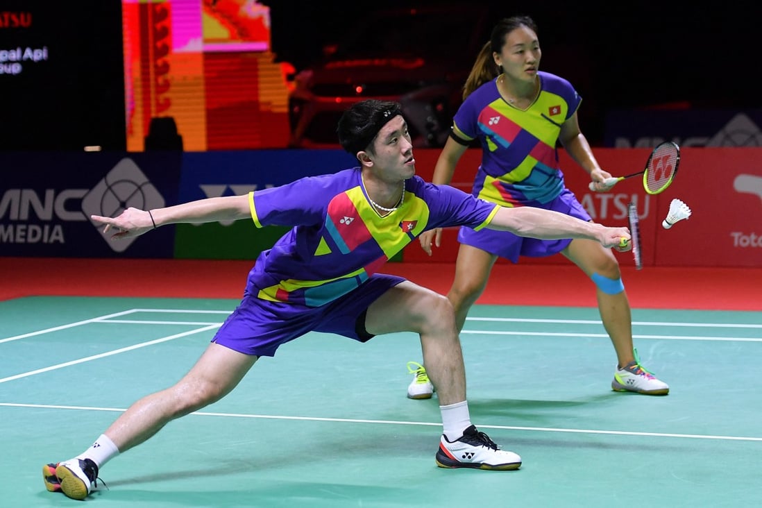 Tang Chun-man and Tse Ying-suet competing against Japan’s Yuta Watanabe and Arisa Higashino during their mixed doubles semi-finals at the Indonesia Masters. Photo: Badminton Association of Indonesia/AFP