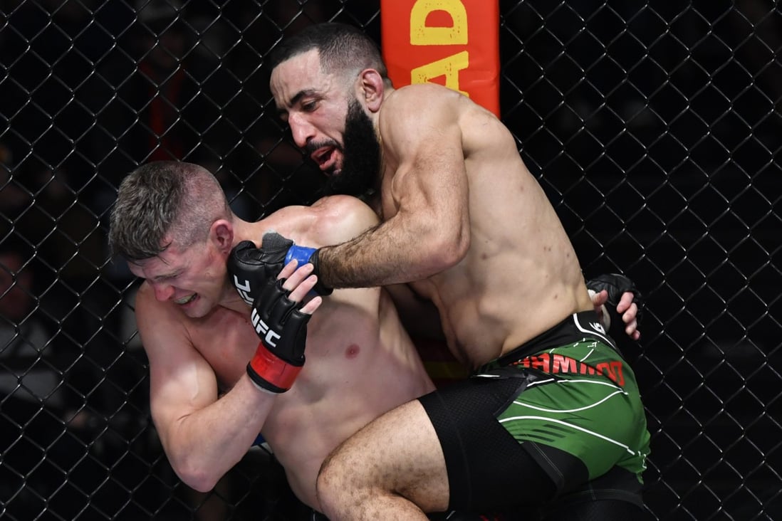 Belal Muhammad punches Stephen Thompson in their welterweight fight at UFC Vegas 45. Photo: Jeff Bottari/Zuffa LLC