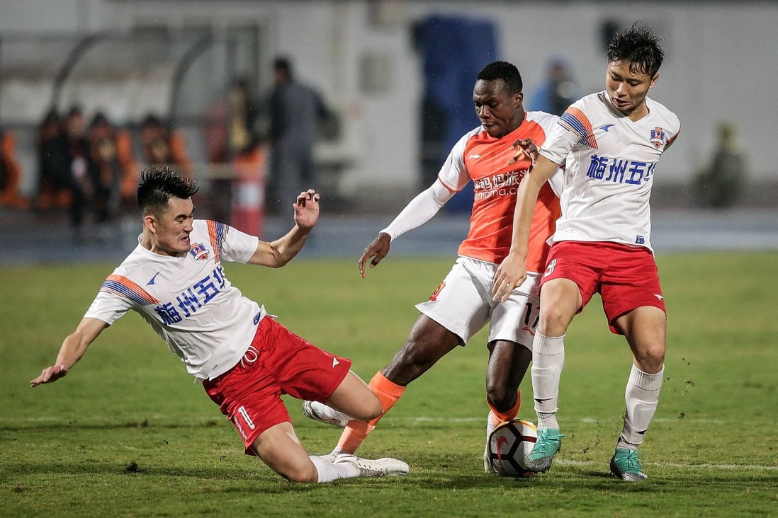 Meizhou Hakka in action during the 2018 Chinese League match against Wuhan Zall. Photo: Getty Images