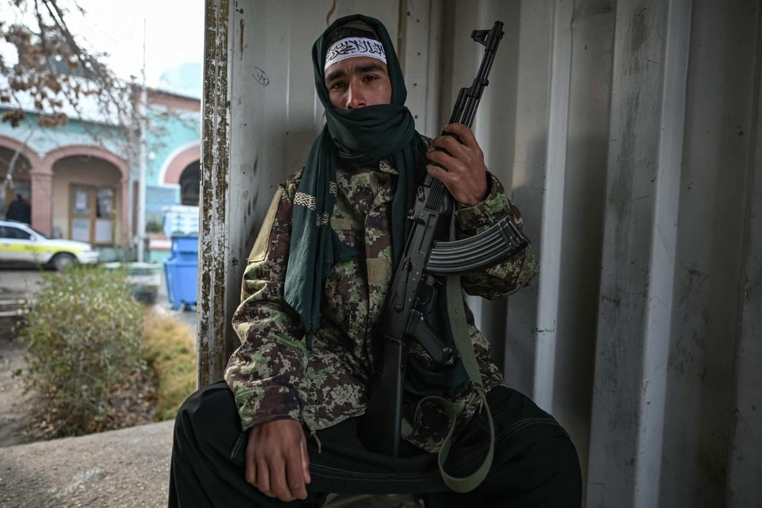 A Taliban fighter sits at a checkpoint in the city of Mazar-i-Sharif, Afghanistan. Photo: AFP