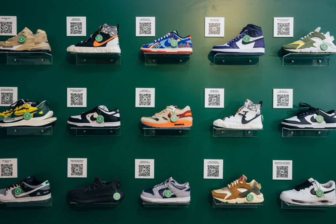 Sneakers on display at a StockX pop-up store in Hong Kong. Sports shoes set a new price record, prompted lawsuits and were worn by an Oscar winner to the Academy Awards in 2021.