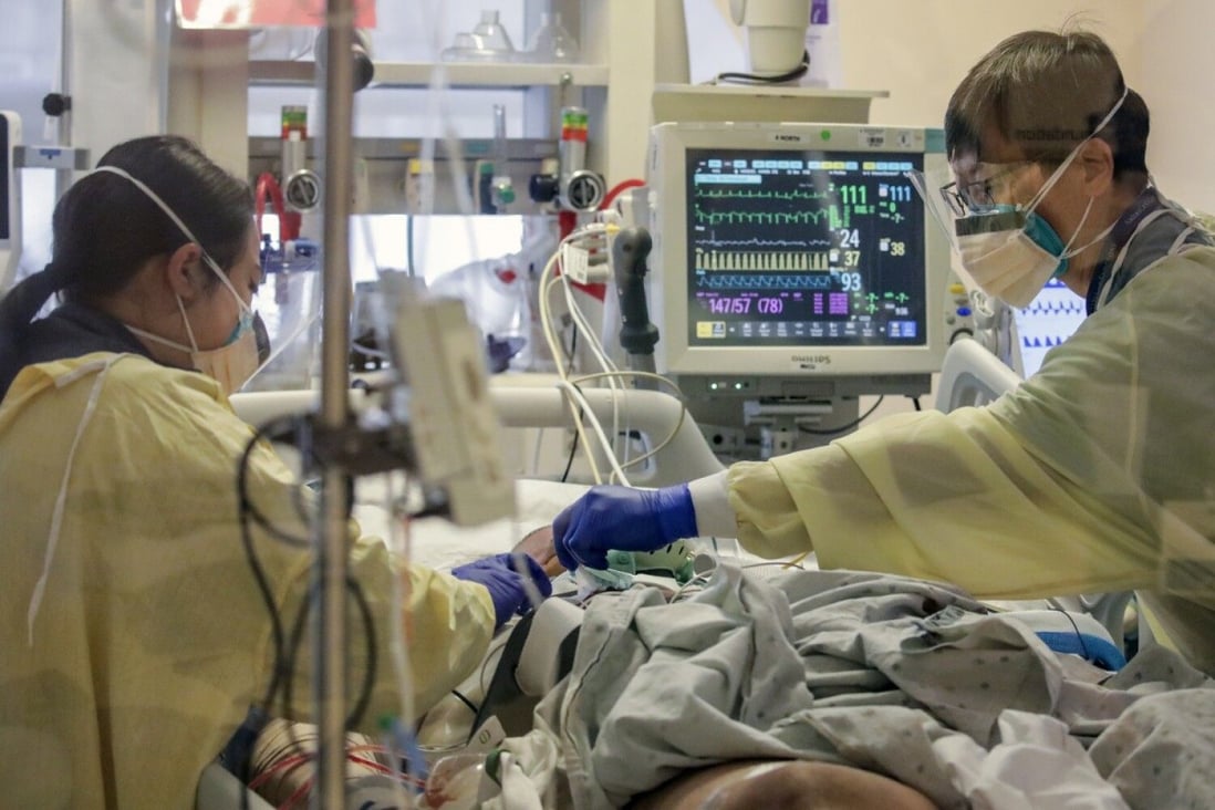 Doctors attend to a Covid-19 patient under treatment in an intensive care unit at a hospital in California. Photo: Los Angeles Times/TNS