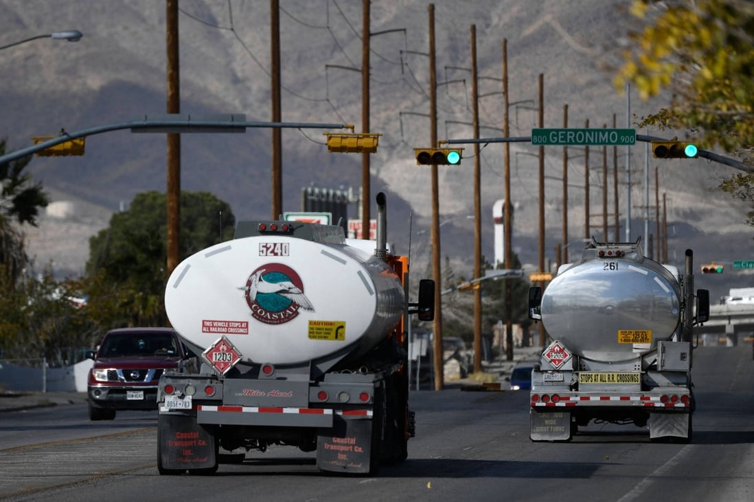 Gasoline tanker trucks drive down a road near the Marathon Petroleum Corp in El Paso Texas. The refinery has a crude oil refinery capacity of approximately 131,000 barrels per calendar day. Photo: AFP