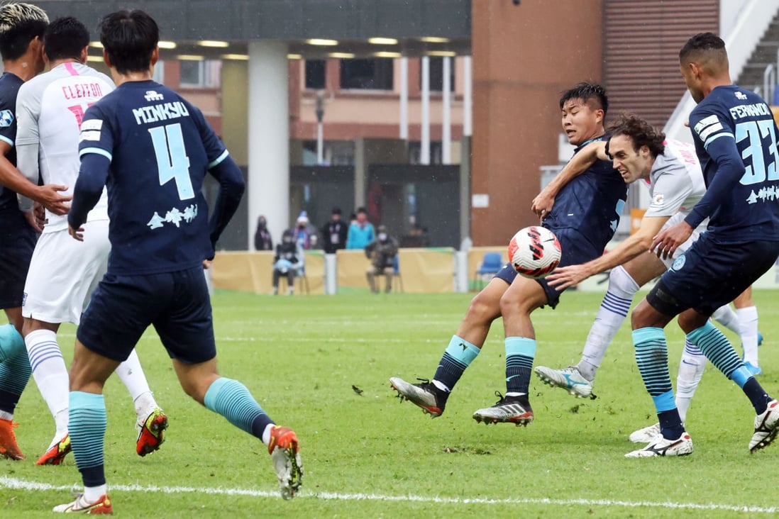 Kitchee’s Jose Paul Urdiales is sandwiched by Rangers’ players during their FA Cup semi-final at Mong Kok Stadium. Photo: K. Y. Cheng