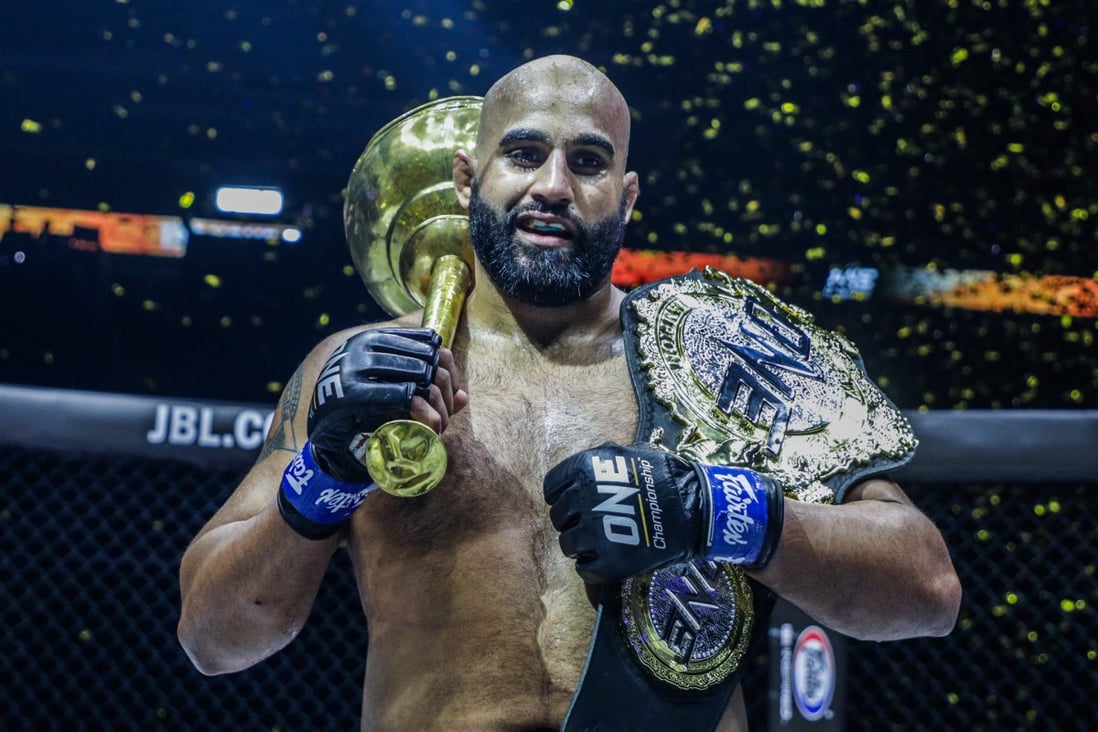 Arjan Bhullar celebrates with his mace and the ONE heavyweight title. Photo: Dux Carvajal/ONE Championship