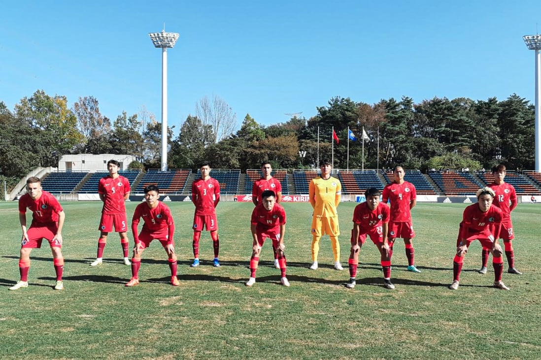 The Hong Kong squad pose before their AFC U23 Championship qualifier against Japan on October 28. Photo: HKFA