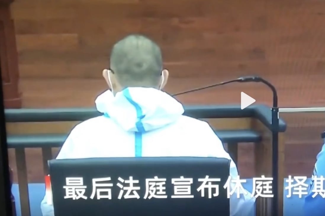 A screenshot shows the back of Zhang Bo’s head (left) during his hearing for murder. Photo: Weibo