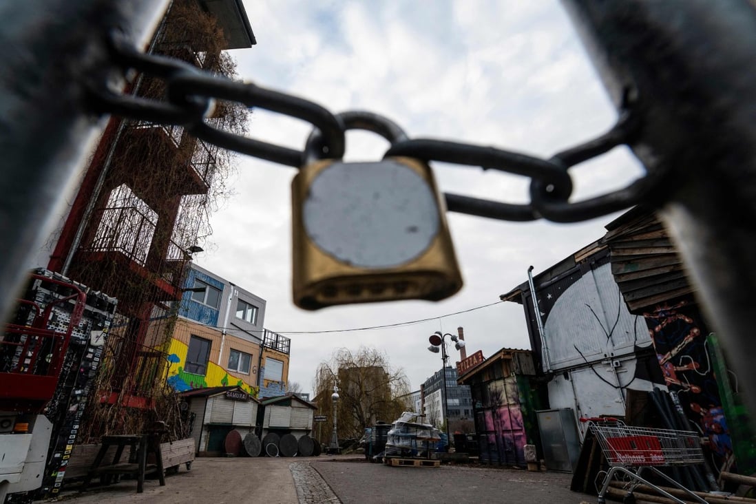 A locked gate blocks access to the Holzmarkt 25 bar area on the banks of the river Spree in Berlin on Monday. Photo: AFP