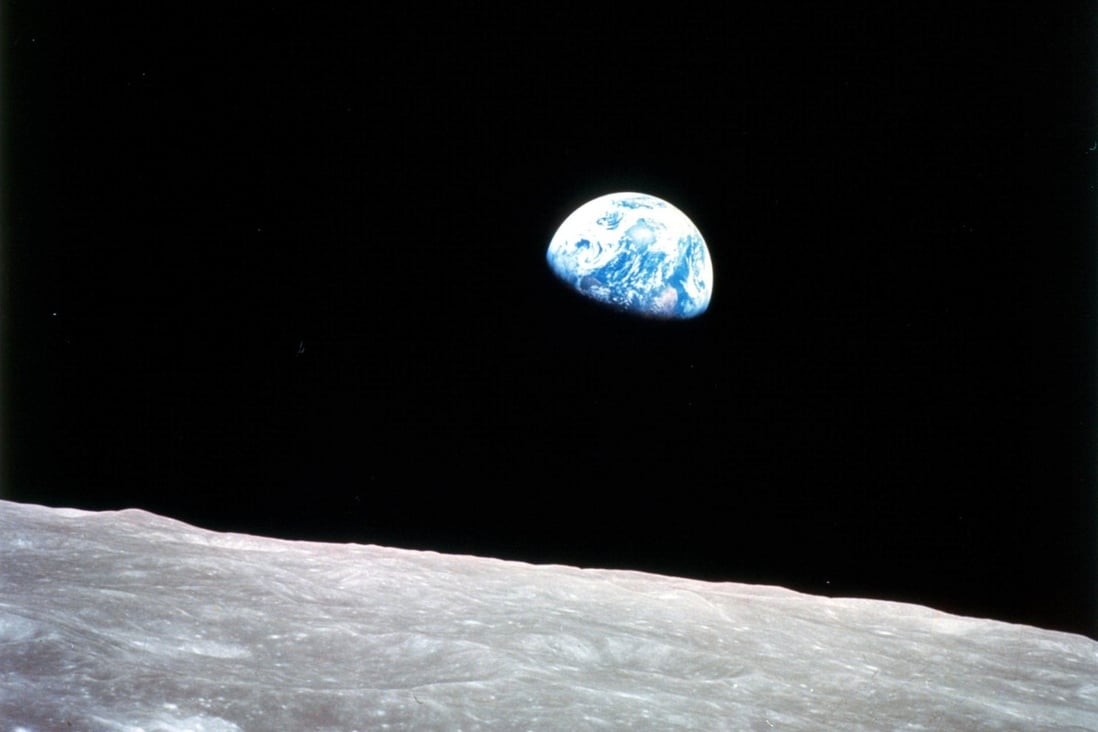 Earthrise over the moon. China aims to set up a lunar research base sooner than planned. Photo: AFP/Nasa