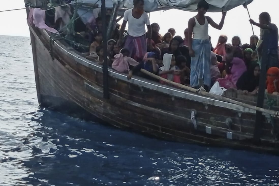 Rohingya refugees stranded on a wooden boat on the water off Bireuen, Aceh province, Indonesia. Photo: EPA