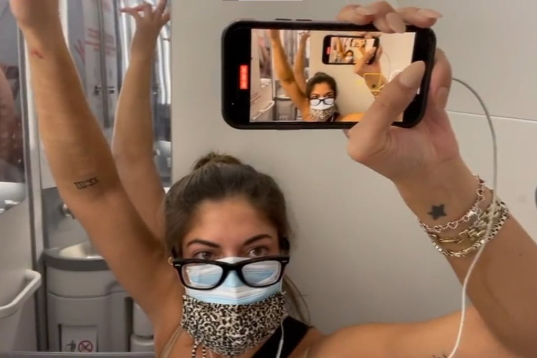 US schoolteacher Marisa Fotieo posted a video of herself spending five hours in a plane toilet after testing positive for Covid-19 in mid-flight. Photo: Marisa Fotieo via TikTok