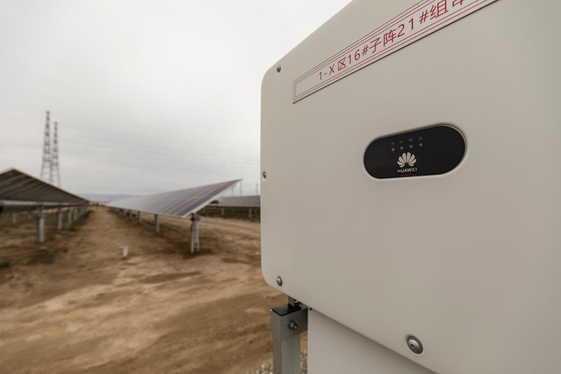 Huawei equipment next to photovoltaic panels at a solar farm operated by Yellow River Power in Gonghe County, Qinghai province, on September 27. Photo: Bloomberg 