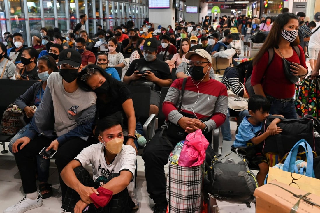 Crowd at a bus terminal in the Philippines where Covid-19 cases are high. Photo: Reuters