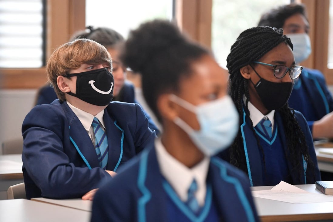 School pupils wear protective face masks at Harris Academy Sutton, London. Photo: Reuters