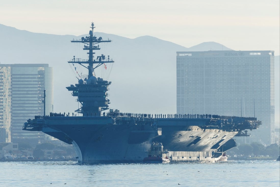 The USS Abraham Lincoln makes history as thousands of service members deploy under Captain Amy Bauernschmidt, the first woman to lead a nuclear carrier. Photo: Reuters