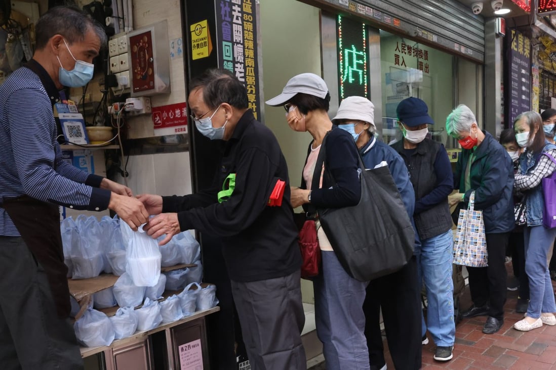 A shop in Wan Chai hands out free congee for the elderly on November 22. Photo: K.Y. Cheng