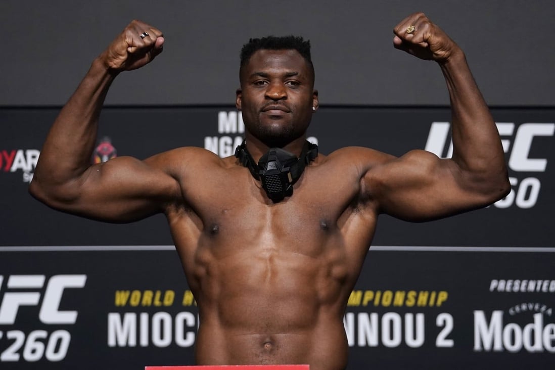 Francis Ngannou poses on the scale during the UFC 260 weigh-ins. Photo: Jeff Bottari/Zuffa LLC
