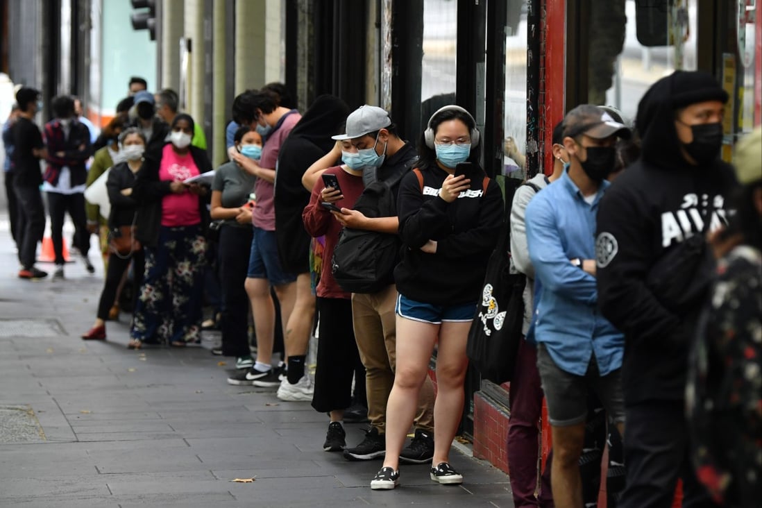 People wait in line at a Covid-19 testing site in Melbourne, Australia, on Wednesday. Photo: EPA-EFE