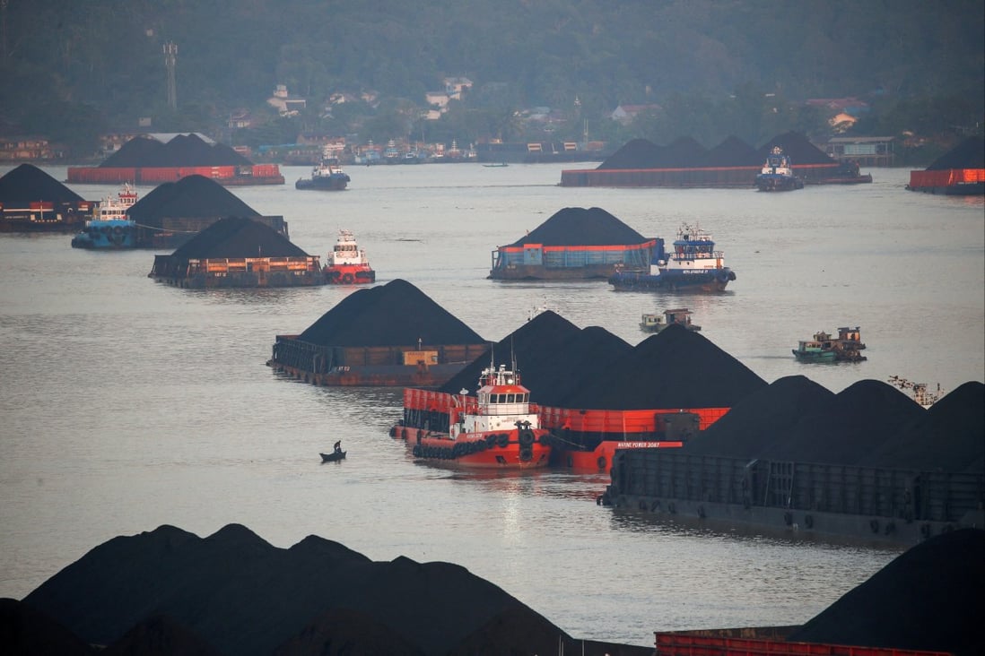 Coal barges on the Mahakam river in Samarinda, East Kalimantan province, Indonesia. Photo: Reuters