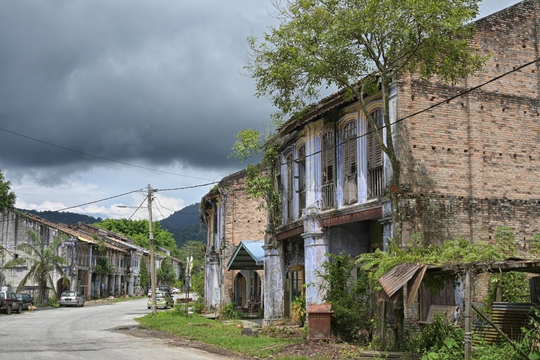 Crumbling heritage houses in Papan, Malaysia. The former tin mining town is at the centre of a struggle between residents who’d like to turn it into a tourist attraction and those who’d prefer to leave just how it is. Photo: Philippe Durant