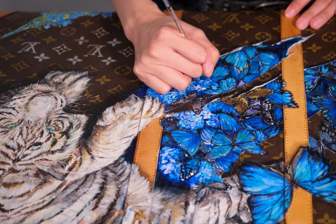 A Louis Vuitton bag with tigers and butterflies added by Hong Kong artist Viki Chan features in sustainable fashion label Wear Earthero’s _Reimagined: WE Showcase exhibition.