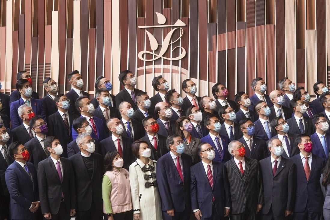 Lawmakers pose for pictures after taking their oaths at the Legislative Council building on Monday. Photo: Sam Tsang