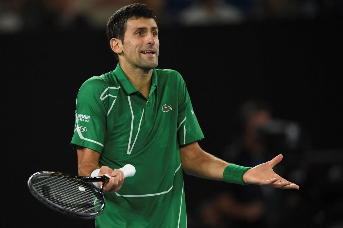 Novak Djokovic reacts after a point against Austria’s Dominic Thiem at the 2021 Australian Open. Photo: AFP