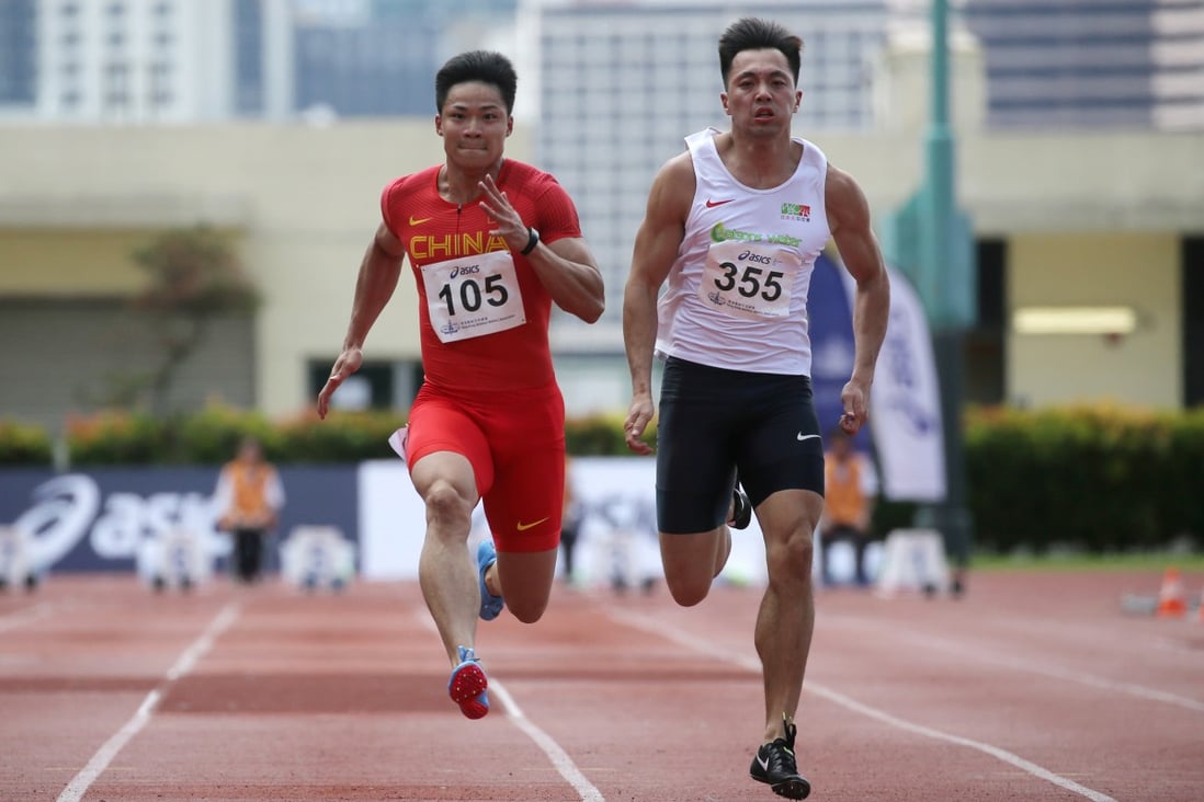 Ng Ka-fung (right) runs against Su Bingtian in the 100 metres at the 2018 Hong Kong Championships at the Wan Chai Sports Ground. Photo: Sam Tsang
