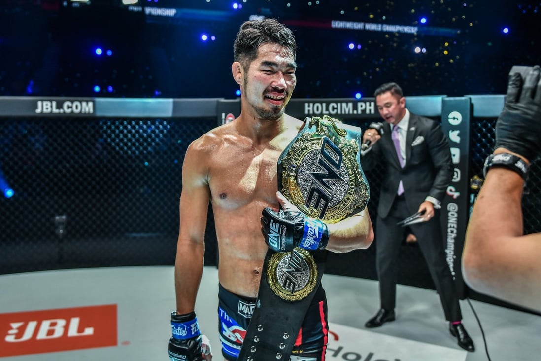 Ok Rae-yoon celebrates his lightweight title win against Christian Lee at ONE: Revolution.