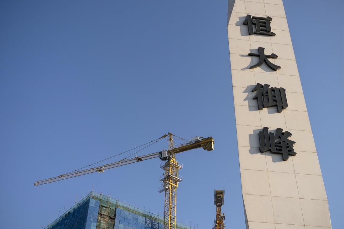 Signage at the construction site of a China Evergrande Group development in Beijing. China has eased a rule relating to the three red lines loan limit imposed on mainland developers. Photo: Bloomberg
