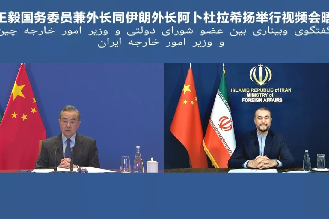 Iranian Foreign Minister Hossein Amir-Abdollahian, pictured during a video call with Chinese counterpart Wang Yi, is to visit Beijing. Photo: Chinese Ministry of Foreign Affairs