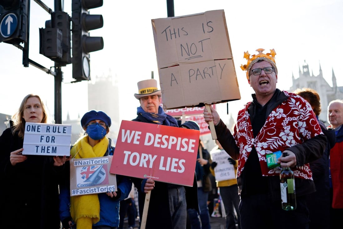 Demonstrators outside the House of Commons in London where Boris Johnson apologised for a lockdown party. Photo: AFP
