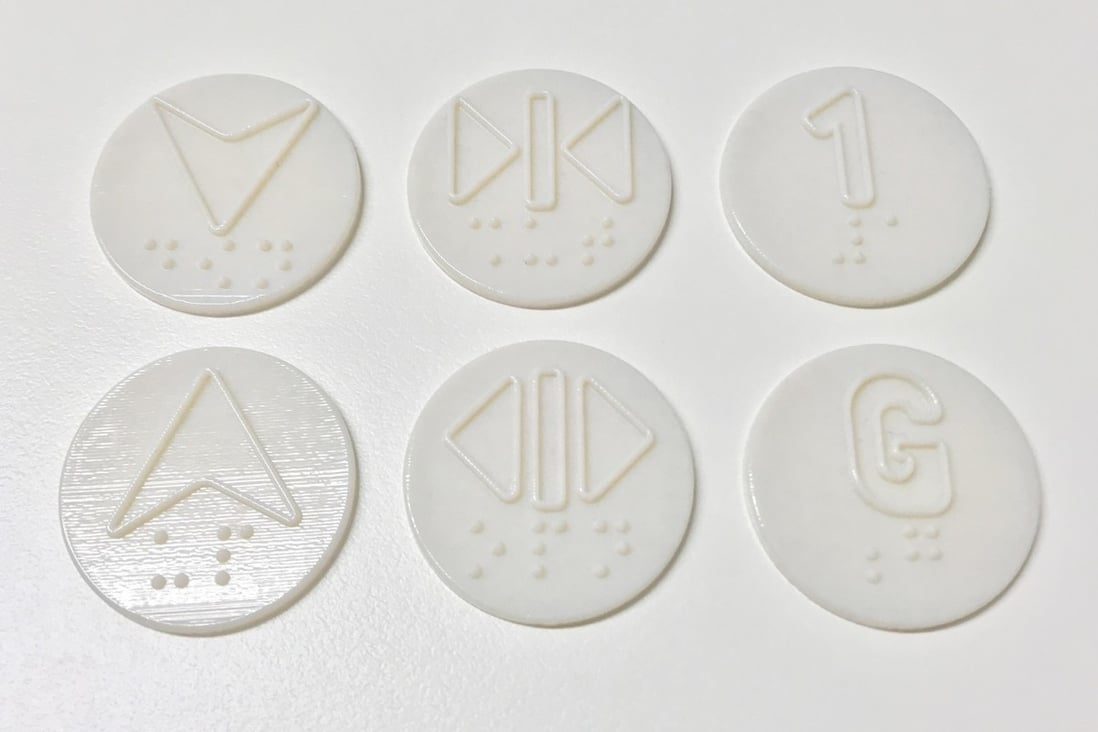 3D printed lift buttons created using the newly developed antivirus material from Hong Kong Polytechnic University. Photo: Handout
