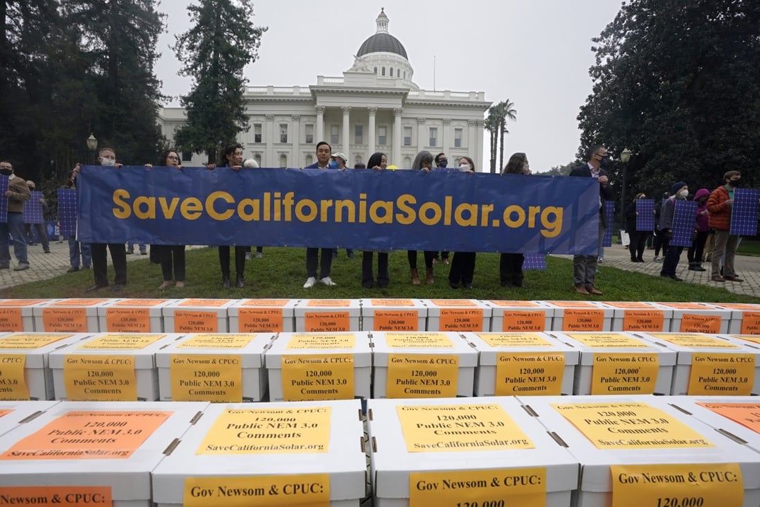 Boxes of petitions against proposed reforms that solar energy advocates claim would handicap the rooftop solar market are seen in front of the governor’s office during a rally at the Capitol in Sacramento, Calif., Wednesday, Dec. 8, 2021.  Photo: AP 