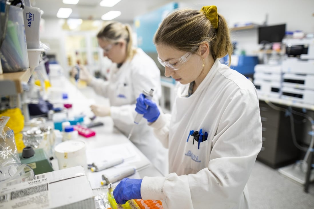 Researchers at a lab in the University of Queensland. Photo: Handout via Xinhua 