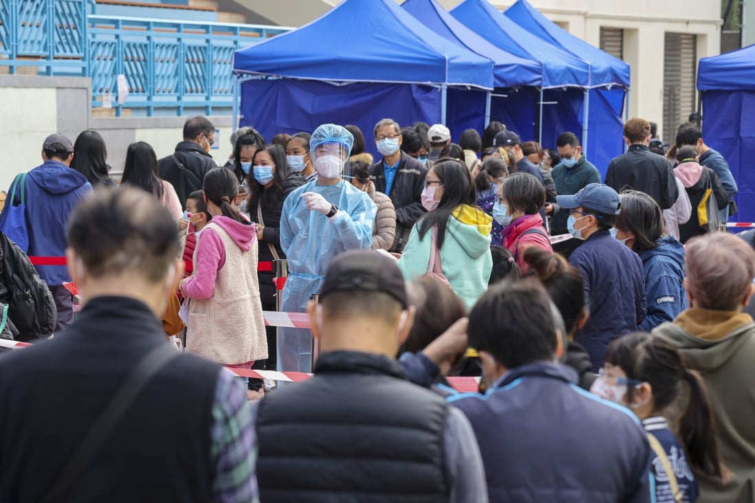 People queue for Covid-19 tests at a sports ground in Tuen Mun on January 13. Photo: May Tse
