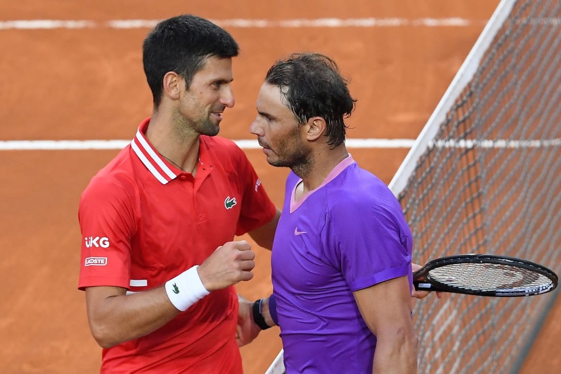 Rafael Nadal (right) is congratulated by Novak Djokovic after winning their men’s singles final at the 2021 Italian Open in Rome. Photo: EPA