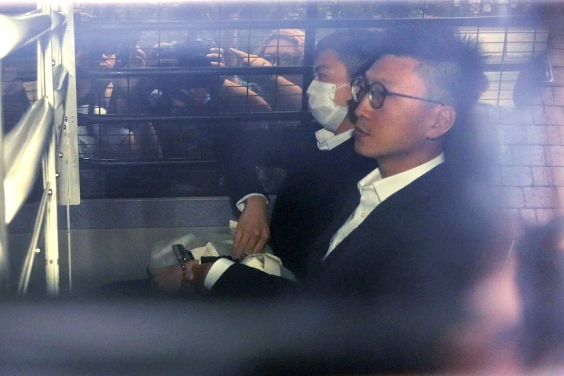 Hong Kong activist Edward Leung is seen in 2019 being escorted in a prison van as he arrives at the court for his sentence appeal. Photo: AP
