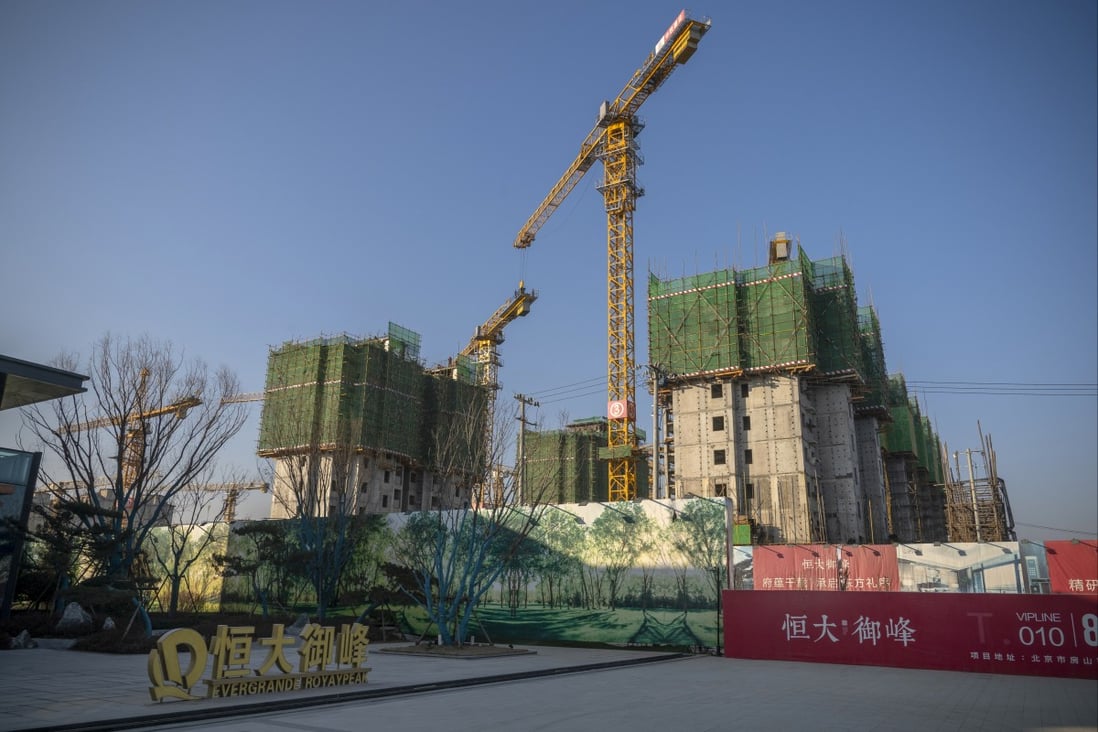 Unfinished apartment buildings at a China Evergrande Group construction site in Beijing, China, in January 2021. Photo: Bloomberg