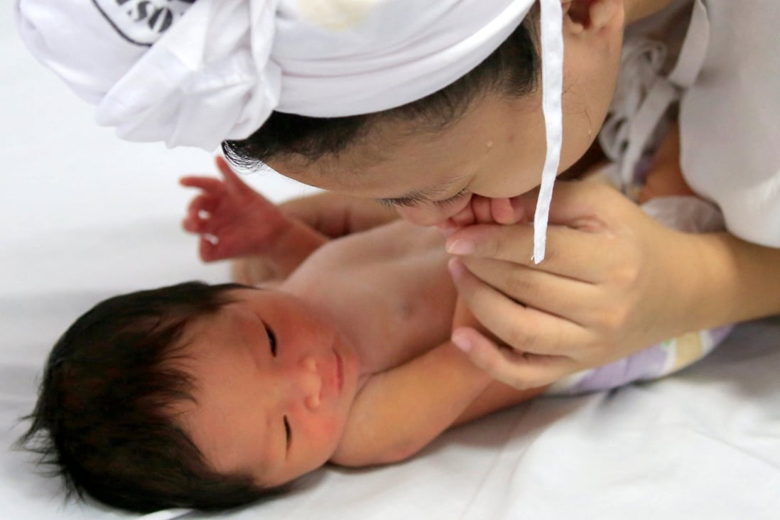 A newborn baby in Manila. Photo: Reuters