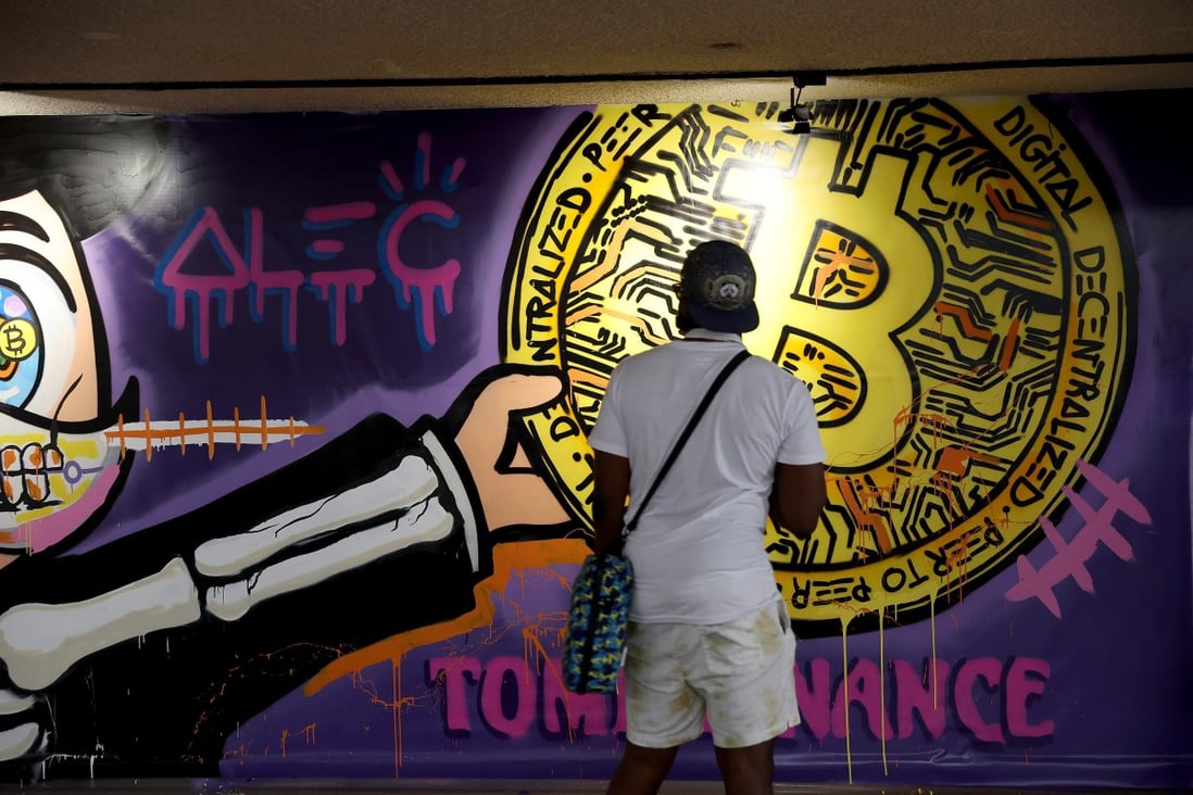 A mural is painted on a wall during the North American Bitcoin Conference on January 19, 2022 in Miami, Florida. Photo: AFP