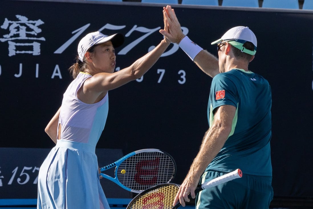 Zhang Shuai  and John Peers celebrate during the mixed doubles first round match at the Australian Open. Photo: Xinhua