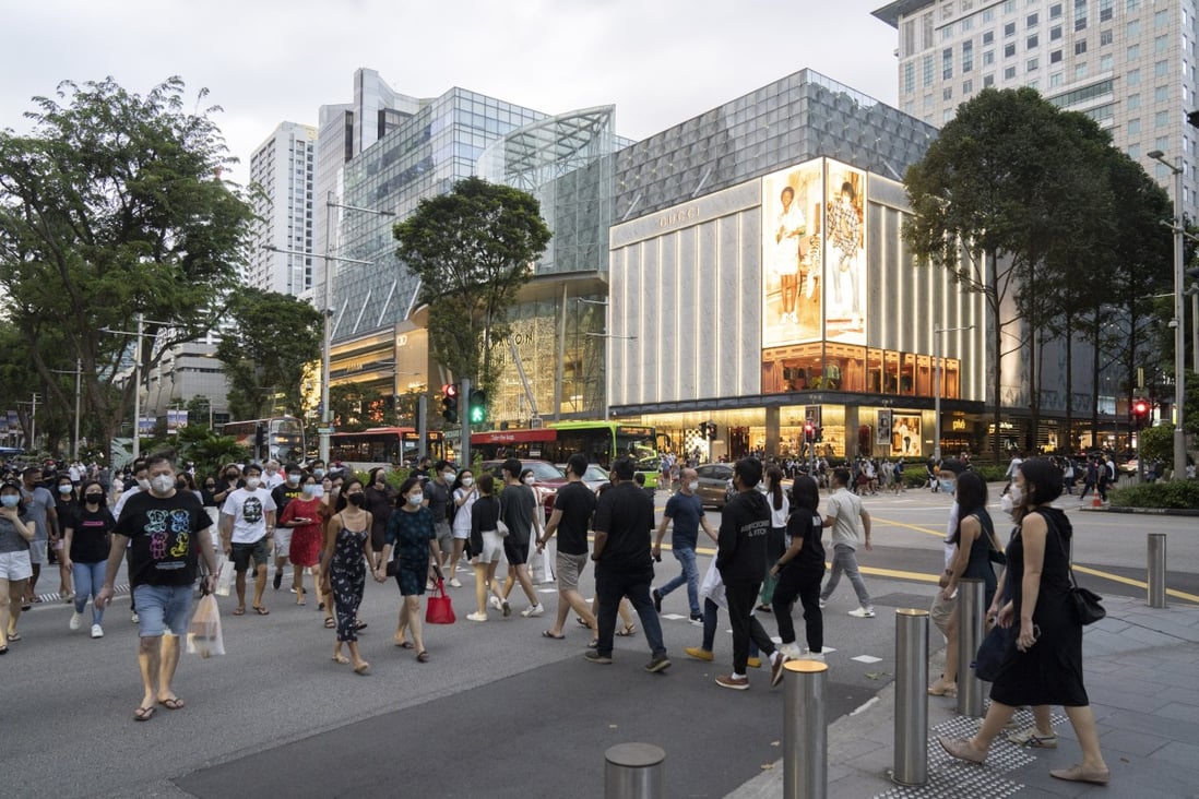 Shoppers on Orchard Road in Singapore. The city state’s central bank said it expects core inflation to be 2.0–3.0 per cent this year. Photo: Bloomberg