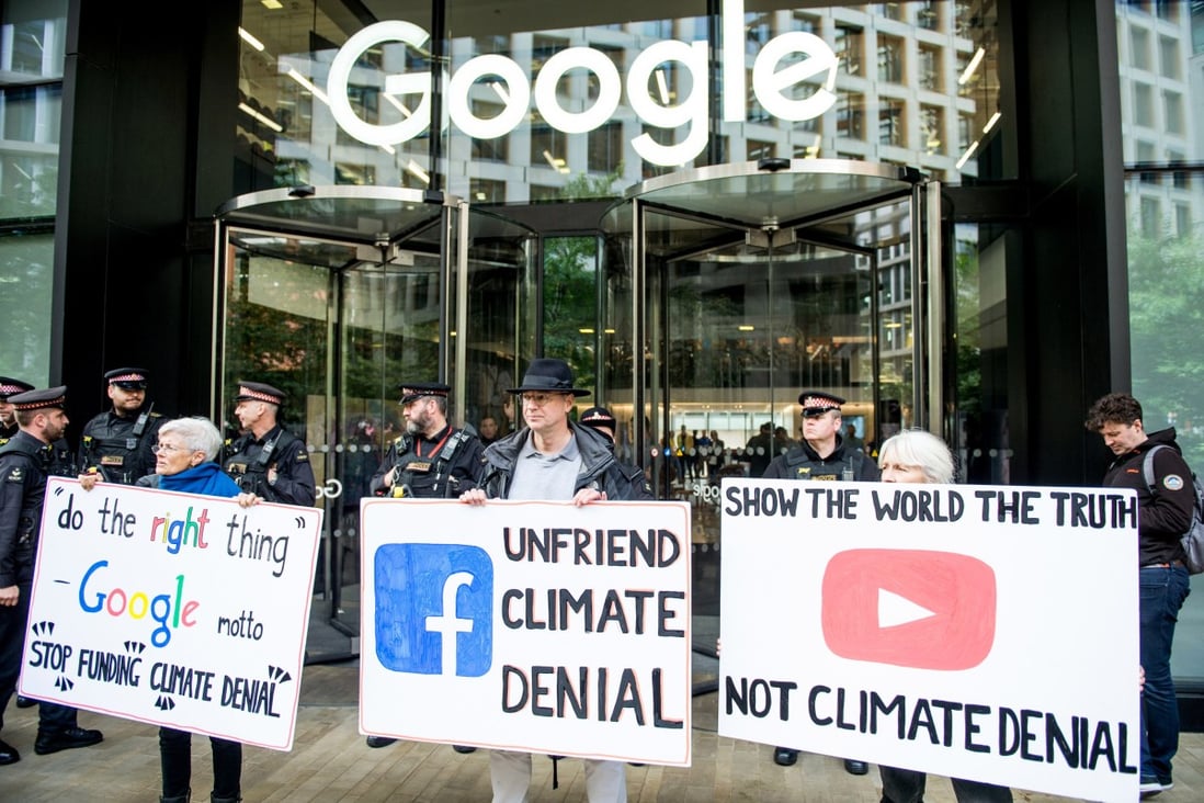 Members of the Extinction Rebellion environmental activist group protest outside Google’s UK headquarters in London demanding it stops climate deniers profiting on its platforms. Climate change falsehoods, hoaxes and conspiracy theories are still prevalent on Twitter, Facebook, TikTok and YouTube, experts say. Photo: Getty Images