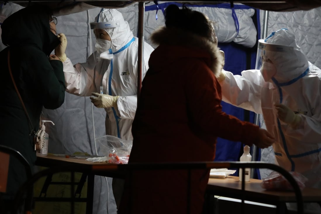 Beijing residents are tested for Covid-19 ahead of the Winter Olympics. Photo: SCMP/Simon Song