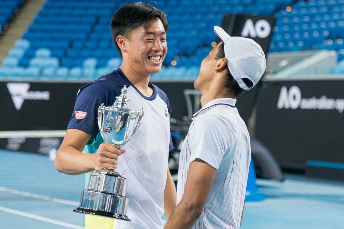 Hong Kong tennis player Coleman Wong (left) with Bruno Kuzuhara after winning the Australian Open Junior Championships boys’ doubles final event in Melbourne. Photo: @arckphoto   