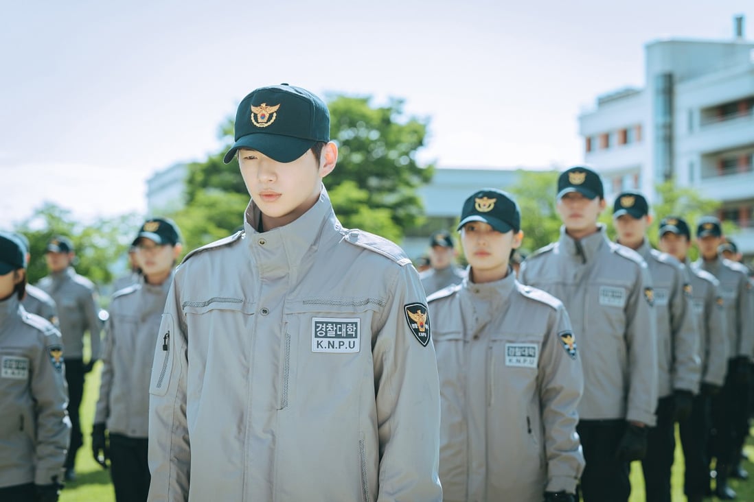 Kang Daniel (front) in a still from Rookie Cops, the new K-drama from Disney+.