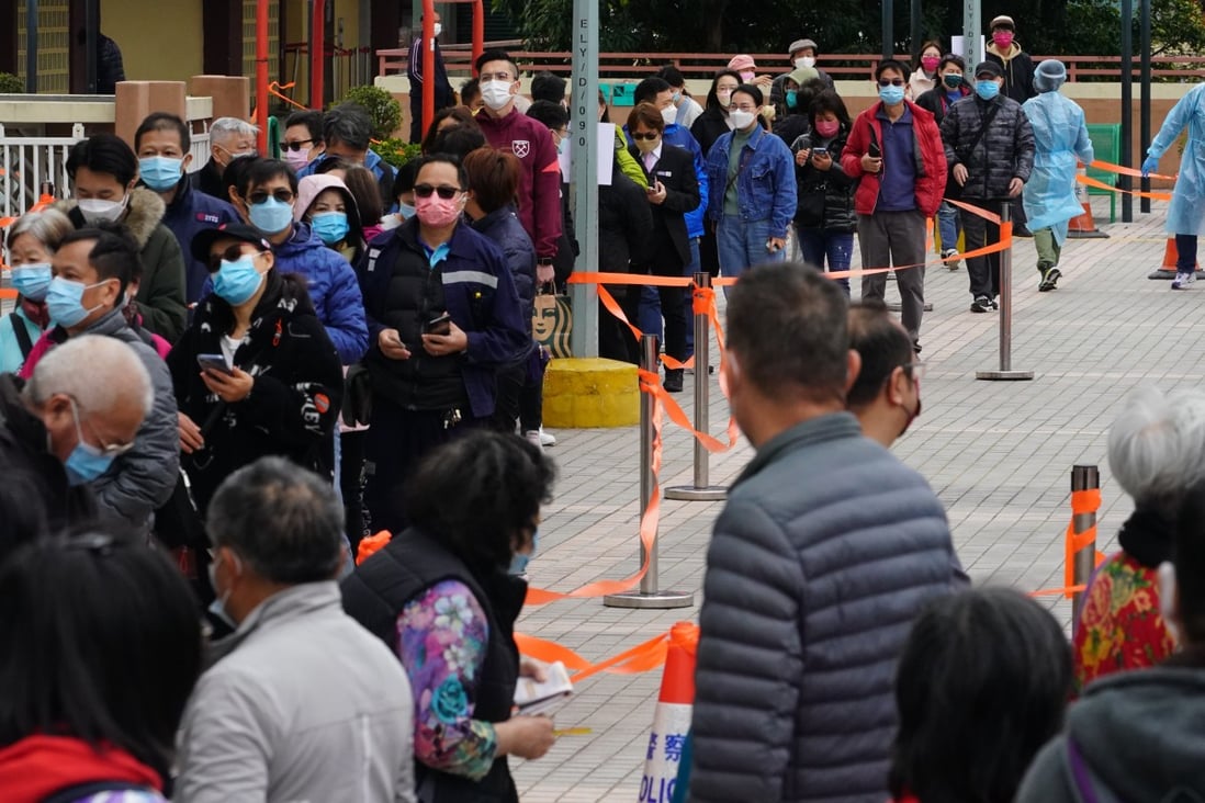 Residents wait to get Covid-19 tests at a mobile station in Hong Kong.
Photo: Felix Wong